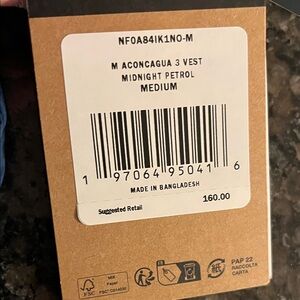 The North Face Navy Puffer Vest